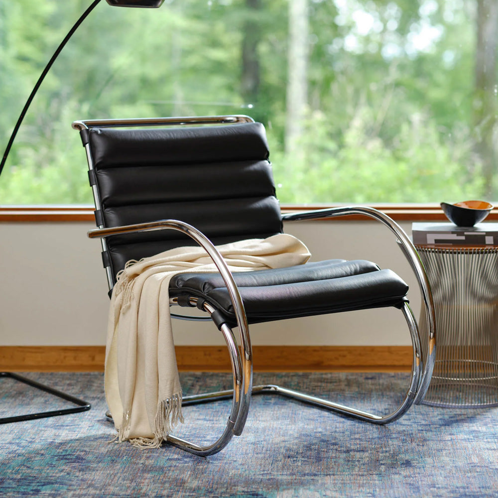 Sillón MR Lounge con apoyabrazos Cuero